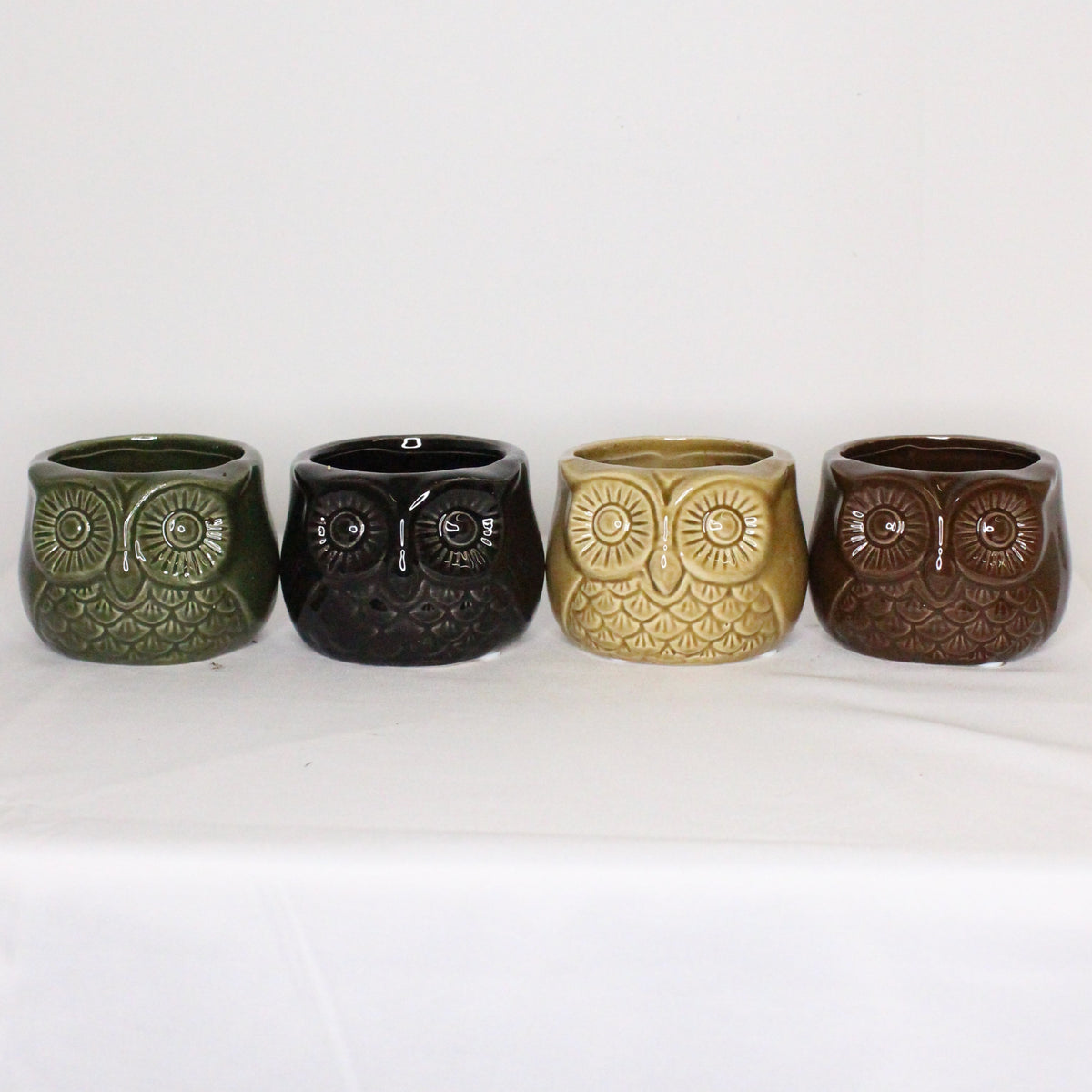 Vaso in ceramica a forma di gufo